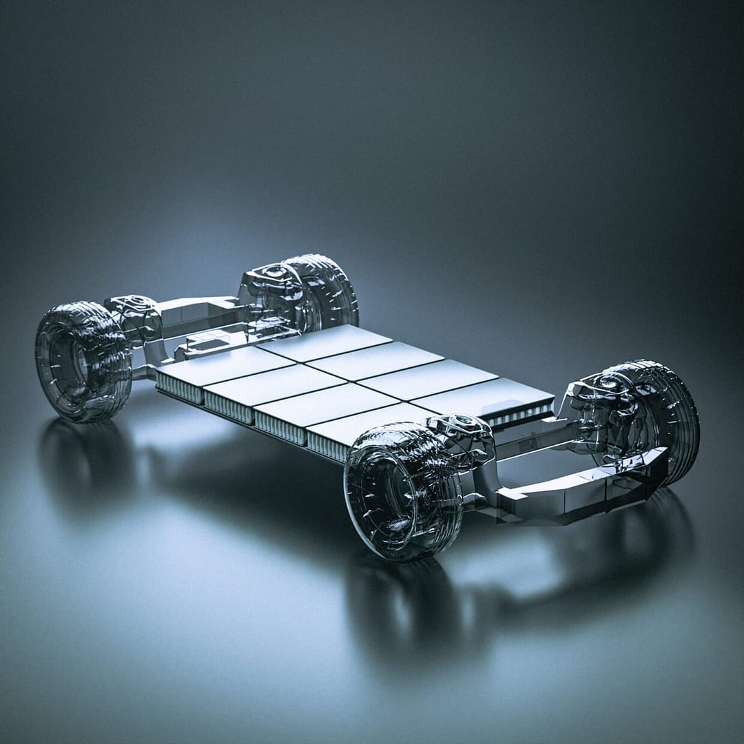 modular-architecture-v2 A futuristic, sleek electric vehicle chassis design displayed on a smooth, reflective surface. The image highlights the battery pack layout and four transparent wheels, showcasing advanced engineering and innovation.