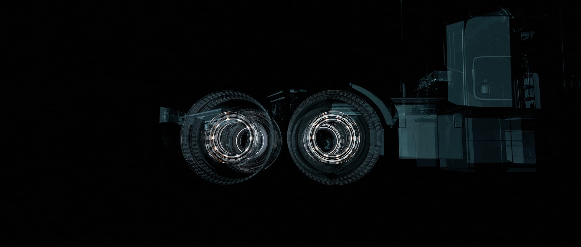 Dark, abstract image featuring two circular, illuminated objects resembling futuristic or digital gears against a black background. Geometric lines and shapes compose the complex design.